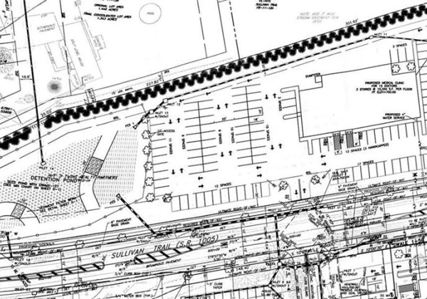 Plan approved for 31,050 3 story medical building with 120 parking spaces (or more). Various uses by right.