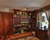 Library/Study with built in bookcases and hardwood floor