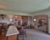 Wet bar, foyer entry, formal living room to the right