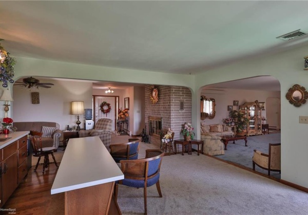 Wet bar, foyer entry, formal living room to the right