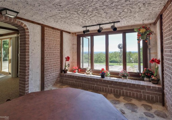 Hot tub room with built-in tiled hot tub