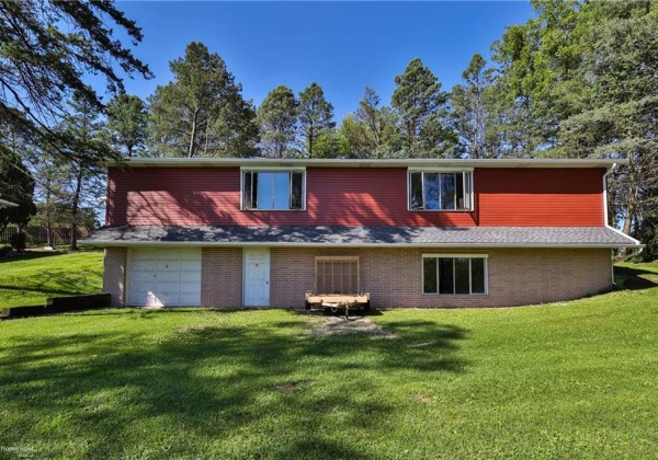 2 Story garage. 1 bay on lower level with oversized workshop