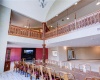 Intricately hand carved wooden railings on the second floor