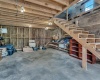 stairs in outbuilding lead up to loft