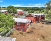 outbuildings across from house