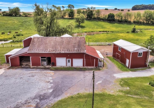 barn across from house w/ 2 oversized box stalls - perfect for quarantine or stallions!