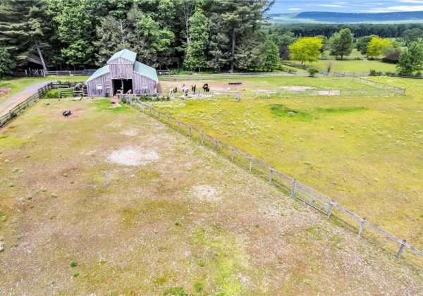 stable & paddock which leads to pastures