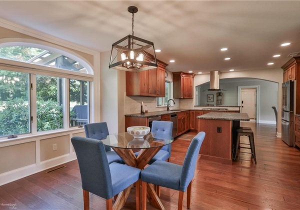 Breakfast nook with rear yard view