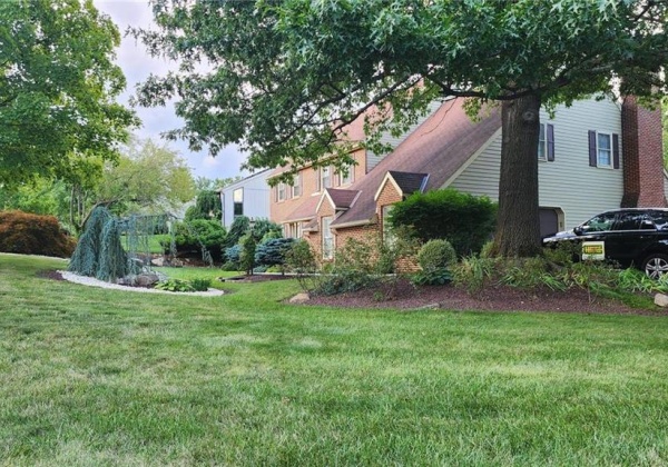 side with 2 car garage and plenty of off street Parking