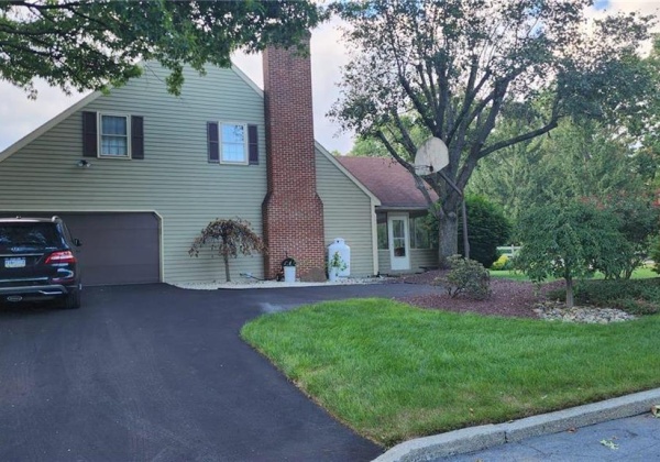 2 car garage, paved parking space