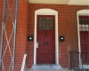 The front door is common access for both units