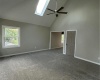 Cathedral ceilings and skylights set off the master bedroom