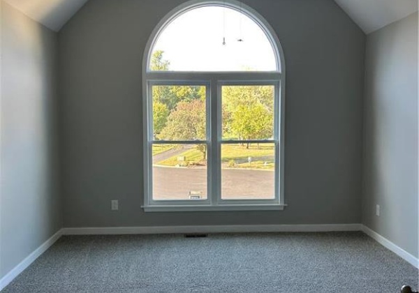 2 second bedroom with cathedral ceilings