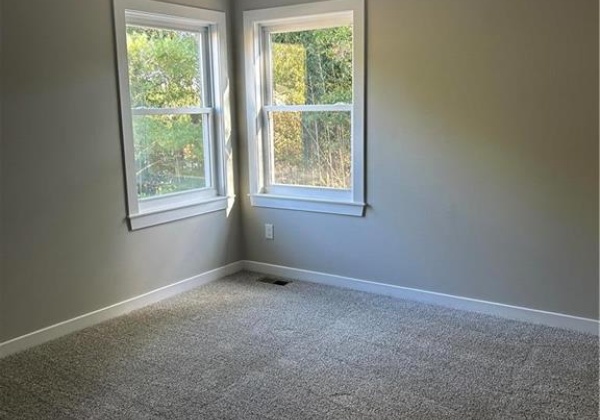 Third bedroom overlooking the backyard