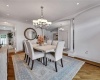 Elegant dining room with inlaid hardwood floors