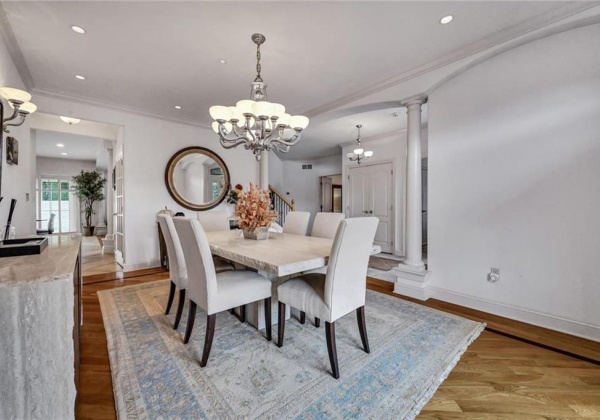 Elegant dining room with inlaid hardwood floors