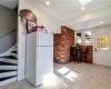 Kitchen w/ Butler Staircase