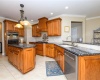 Kitchen with center island and two-tier countertop with seating