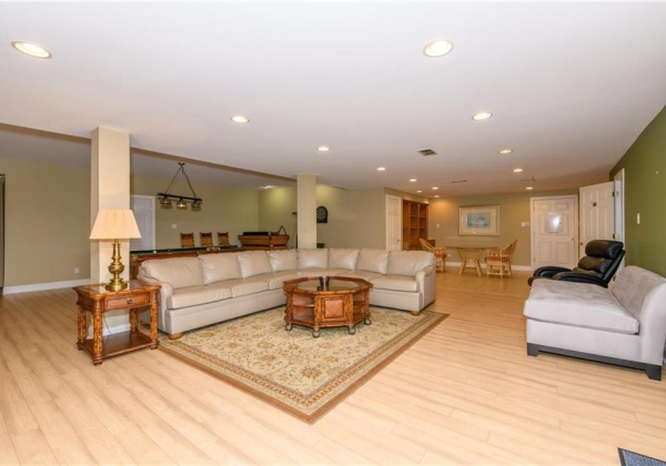 Walk-out lower level recreational room with additional living quarters