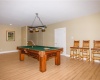 Walk-out lower level recreational room with additional living quarters