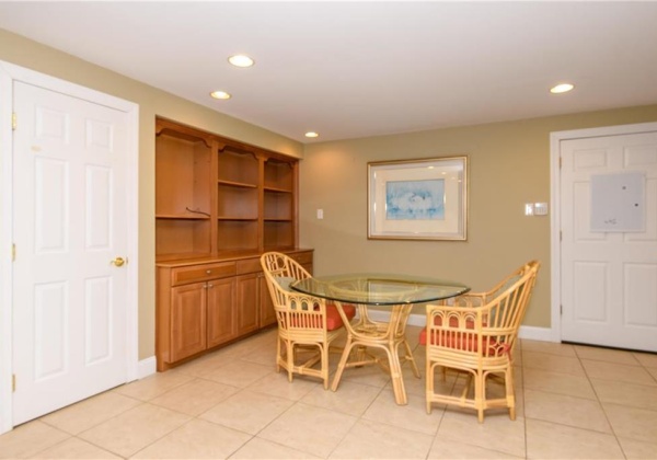 Lower level dining room with built-in cabinetry