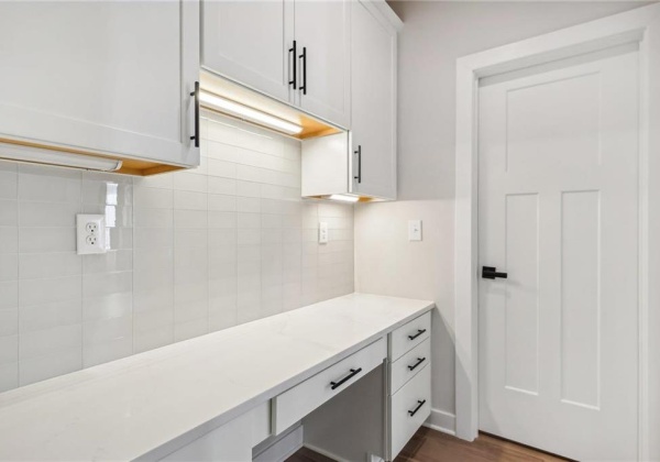 Pantry and desk space off of kitchen