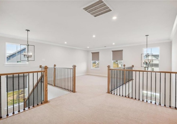 Reception at top of steps and view of loft room second floor