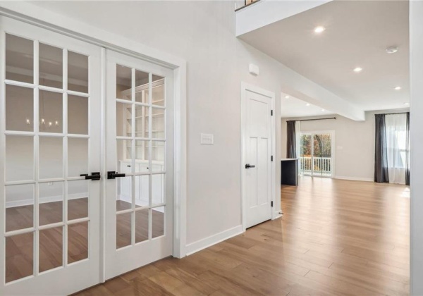 Foyer entrance office accessible via French doors