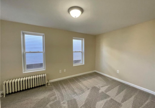 Bedroom one, closet space with natural light - deck acces