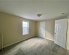 Bedroom two, closet space with natural light