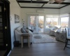 Sunroom with view of deck