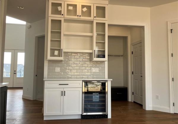 Display cabinets with beverage center