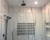 Master bath shower with frameless door