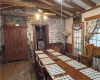 Dining room with stone wall from existing house.