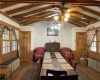 Dining room with matching cedar coat closets.