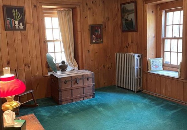 One of the upstairs bedrooms with deep window sills.