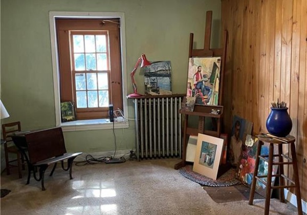 Upstairs bedroom, currently used as an art room.