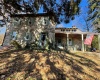 Front of stone farmhouse.