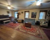 Spacious living room with plenty of natural light from all the windows.