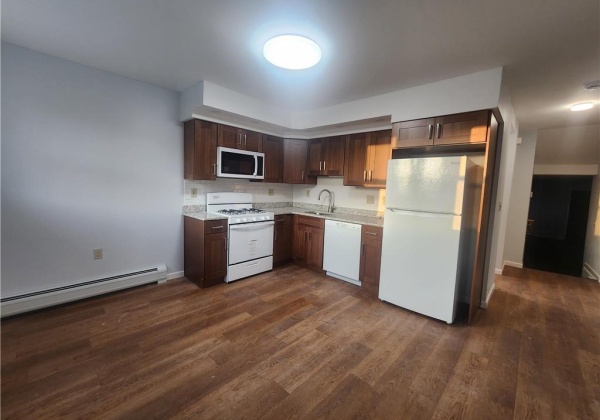 With the new backsplash and fridge