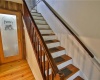 Wide staircase & beautiful new pantry offers tons of storage