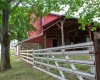 Nice size corral for animals to enjoy. Bank Barn is 35'x50' w/27' interior height on main level to rafters.