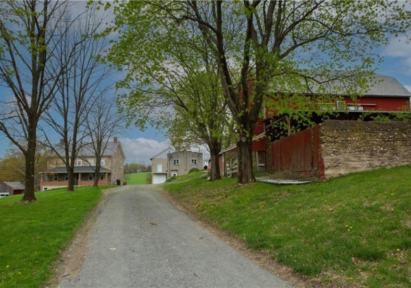 Long driveway welcomes you to your private paradise.