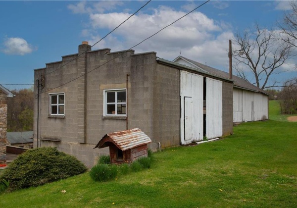 2nd concrete barn - showing upper level access - 15' barn door.