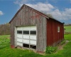 Another smaller garage perfect for lawn equipment