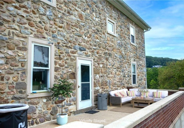 Spacious rear patio for enjoying the back yard views