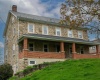 Solid home and lovely front porch