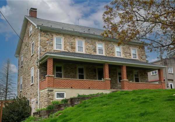 Solid home and lovely front porch