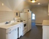 galley kitchen with dining area