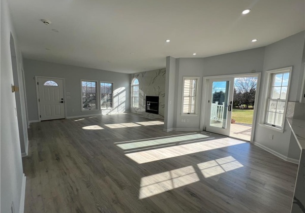 Open concept view from kitchen to living room